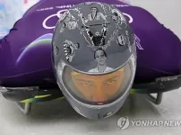 [올림픽] 죽은 동료 사진을 새긴채 뛴 선수.JPG